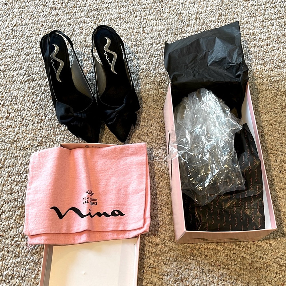 Brand New black pumps from Nina.  Size is 6M